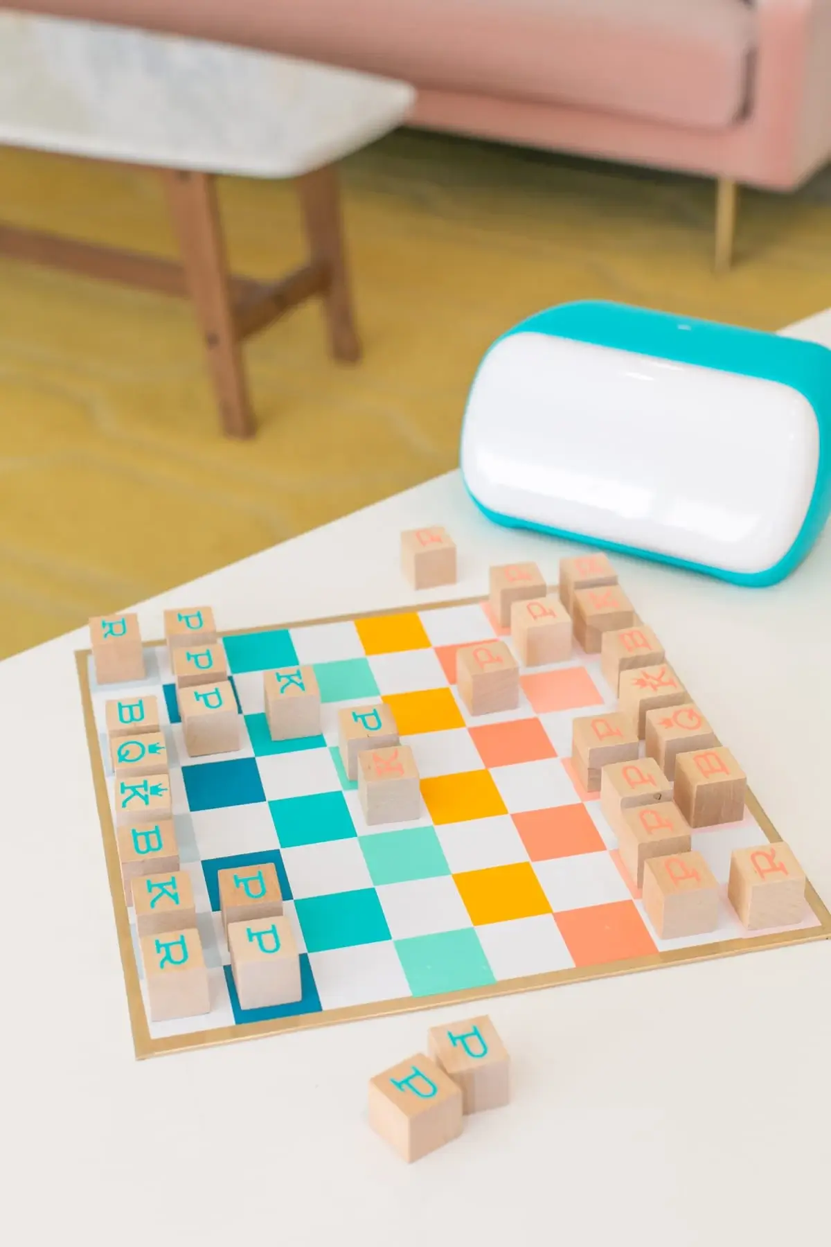 Handmade chess board with pretty pastel colours and cube markers.